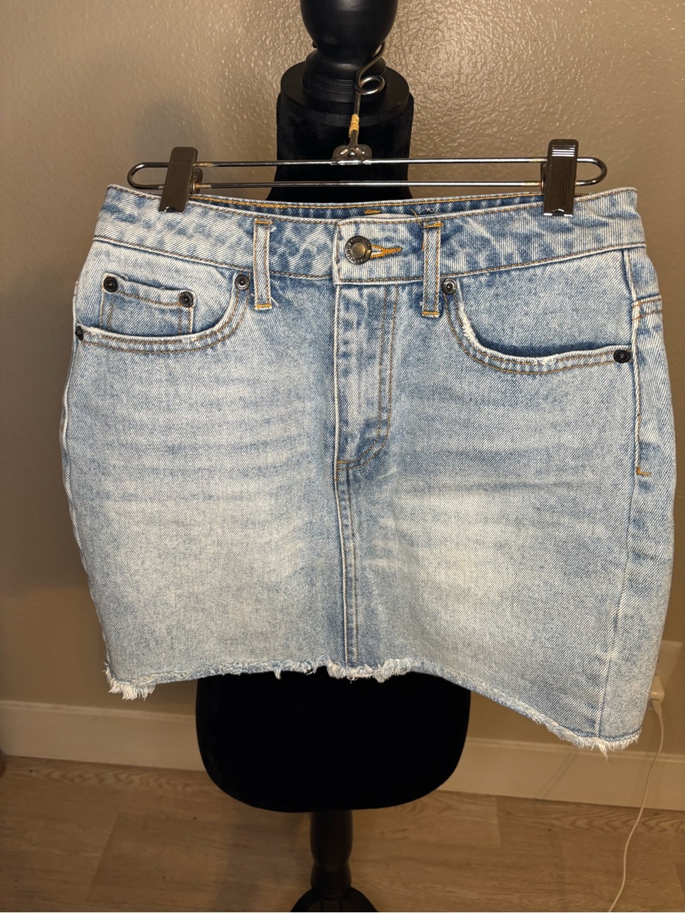 Kittenish Light Wash Distressed Denim Mini Skirt